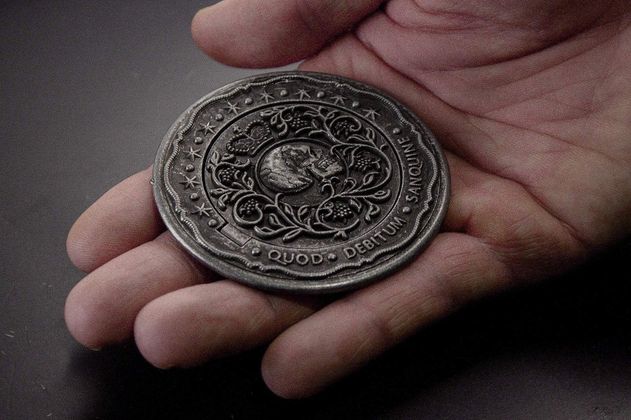 Blood oath marker Continental Hotel coin. Debitum. Keanu J. Wick. gold coin